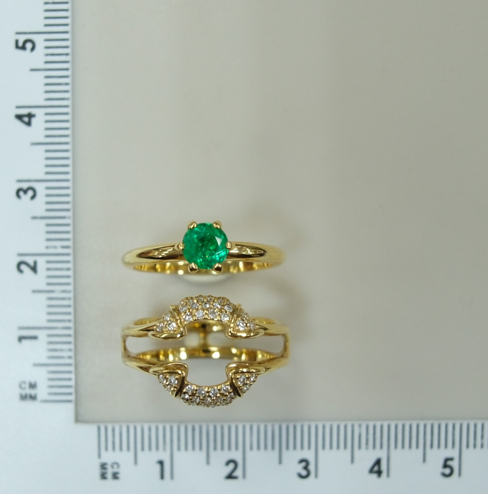 Кольцо-трансформер из желтого золота с изумрудом